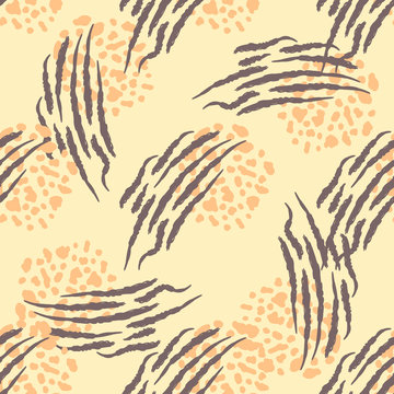 Abstract geometric seamless pattern with animal print. Trendy hand drawn textures.