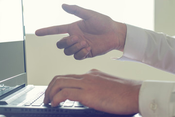 Hands of businessmen who are using the keyboard