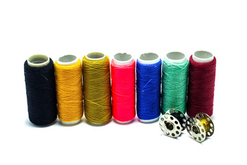 Multicolor threads on white background