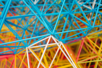 abstract colorful shapes from plastic sticks