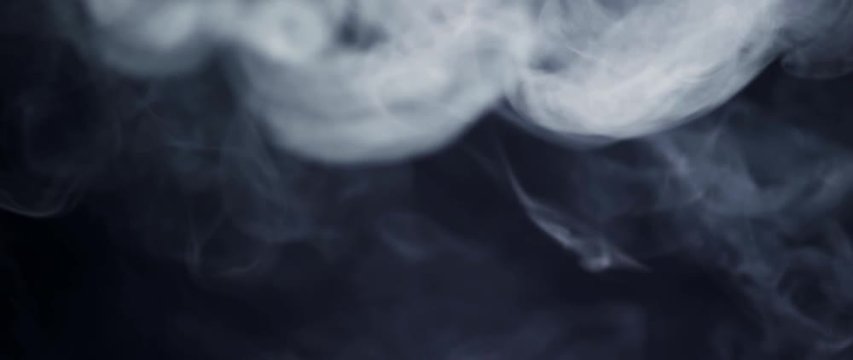 Top Grey Smoke On Black Background Slow Motion Footage