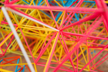 abstract colorful shapes from plastic sticks