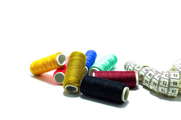 Multicolor threads on white background