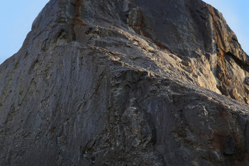 Large block of stone, iron ore.