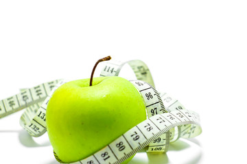 Centimeter with green apple