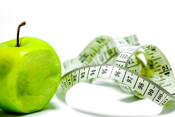 Centimeter with green apple