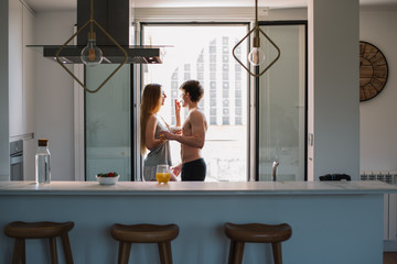 Couple having breakfast at home