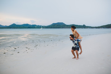 mother and son on the beach