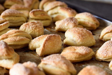 Baking from cottage cheese on a baking sheet in the oven