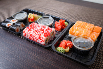 Takeaway sushi set fast food delivery concept image