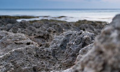 black coastal rock closeup view background