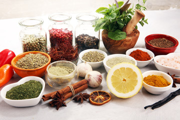 Spices and herbs on table. Food and cuisine ingredients with basil