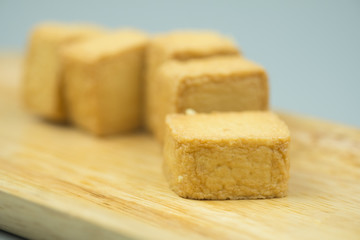 Fish meat tofu, yellow meatball square shape.
