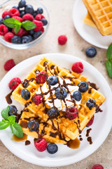 Fresh homemade waffles with blueberries and raspberries 
