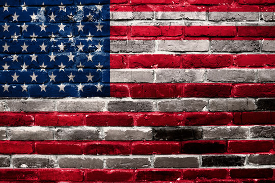 USA flag images on brick wall