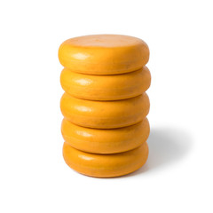  Stack of whole yellow cheeses