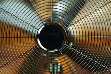 Closeup on electric metallic fan