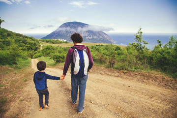Father and son together outdoor.