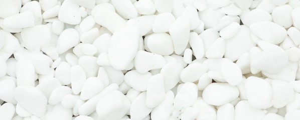 White pebbles stone texture and background.
