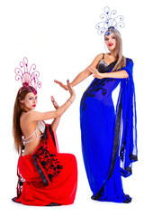 beautiful young dancers wearing oriental costumes