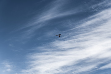 Fototapeta na wymiar Small aircraft in the sky