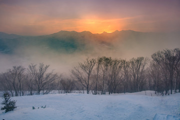 Sunset view on the top of Moiwa mountain in winter snow