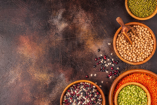 Assortment of Legumes - lentils, peas, mung, chickpeas and different beans. © tbralnina