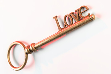 Beautiful Antique Key with the word Love. Love is the key to happiness