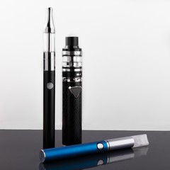 electronic cigarettes or vaping devices on white background