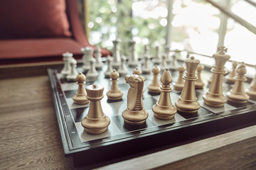 Chess is placed on a table for the evening entertainment adds stress and loneliness, brain development.