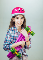 plastic mini cruiser board. Spring. Hipster girl with penny board. skateboard sport hobby. Summer...