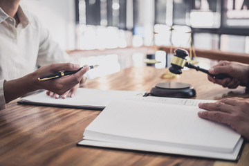 Male lawyer or judge consult having team meeting with Businesswoman client, Law and Legal services...