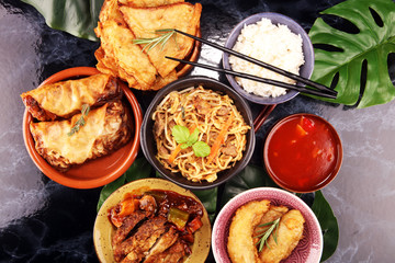 Assorted Chinese food set. Chinese noodles, fried rice, peking duck, dim sum, spring rolls. Famous...