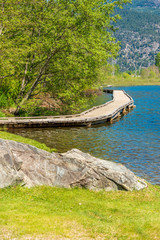 Naklejka premium View at Wooden Trail in Park and Lake. Vancouver, Canada.