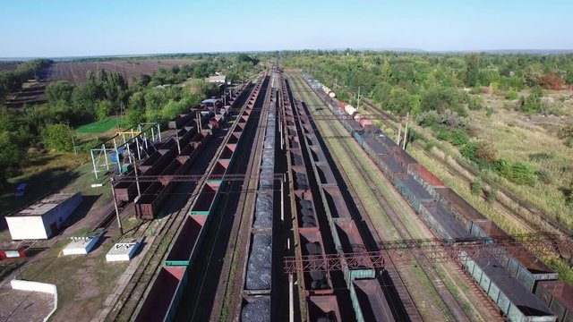 Aerial view of coal trains in a freight depot - coal, mining, train.