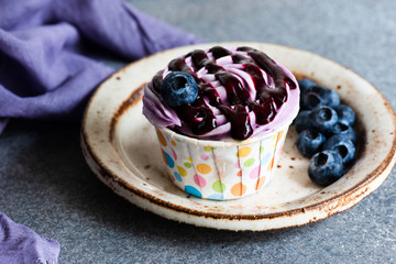 Blueberry cupcake on plate