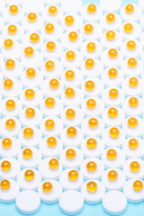 Omega-3 capsules of fat on a white background in the form of white tablets.Ball of fish oil on a white background.