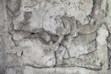 Texture of a concrete wall with cracks