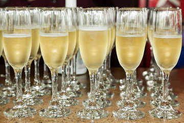 glasses served with champagne, to make a toast at a social event.