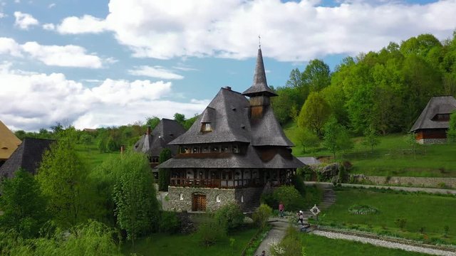 Aerial view over Barsana Monastery, Maramures - Romania. Wooden church UNESCO world heritage site
