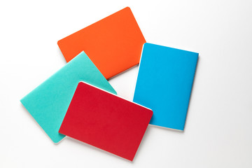 colorful School notebooks on white background with copy space for text - Bilder. mockup for office,student,school concept
