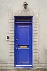 Fototapeta na wymiar Beautiful entrance blue door, Manhattan New York, USA.