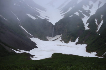 waterfall on Kamchatka which is located on the road to the Mutnovsky geothermal power station