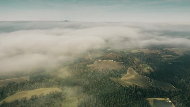 FPV shot of flight above clouds over Umbria region, Italy
