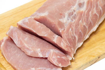 Pork chop isolated on white background. Meat on a white background. Raw meat .