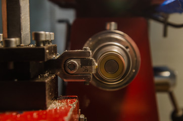 Fototapeta na wymiar Machining of cylindrical parts on a lathe machine.