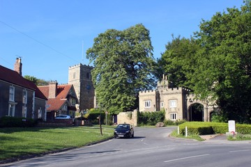 All Saints Church and gateway to Cave Castle, South Cave, East Riding of Yorkshire.