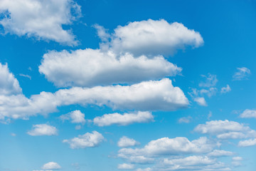 Clouds on the blue sky.