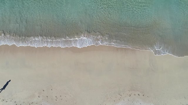 video of a galicia beach with people walking