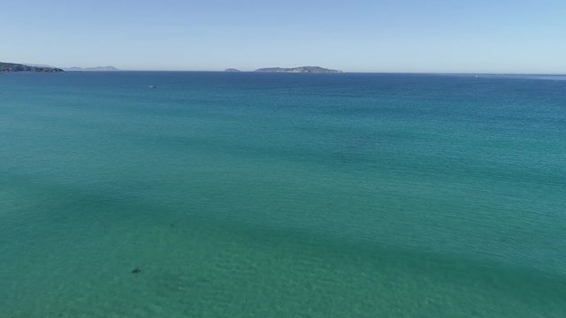 video of a galicia beach with people walking